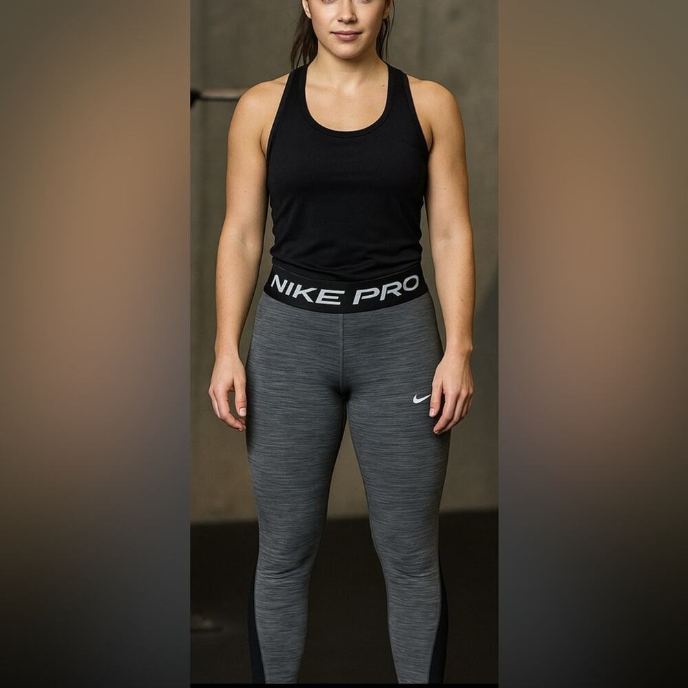 Woman’s Nike Pro Heather Gray with black mesh Leggings Size Small